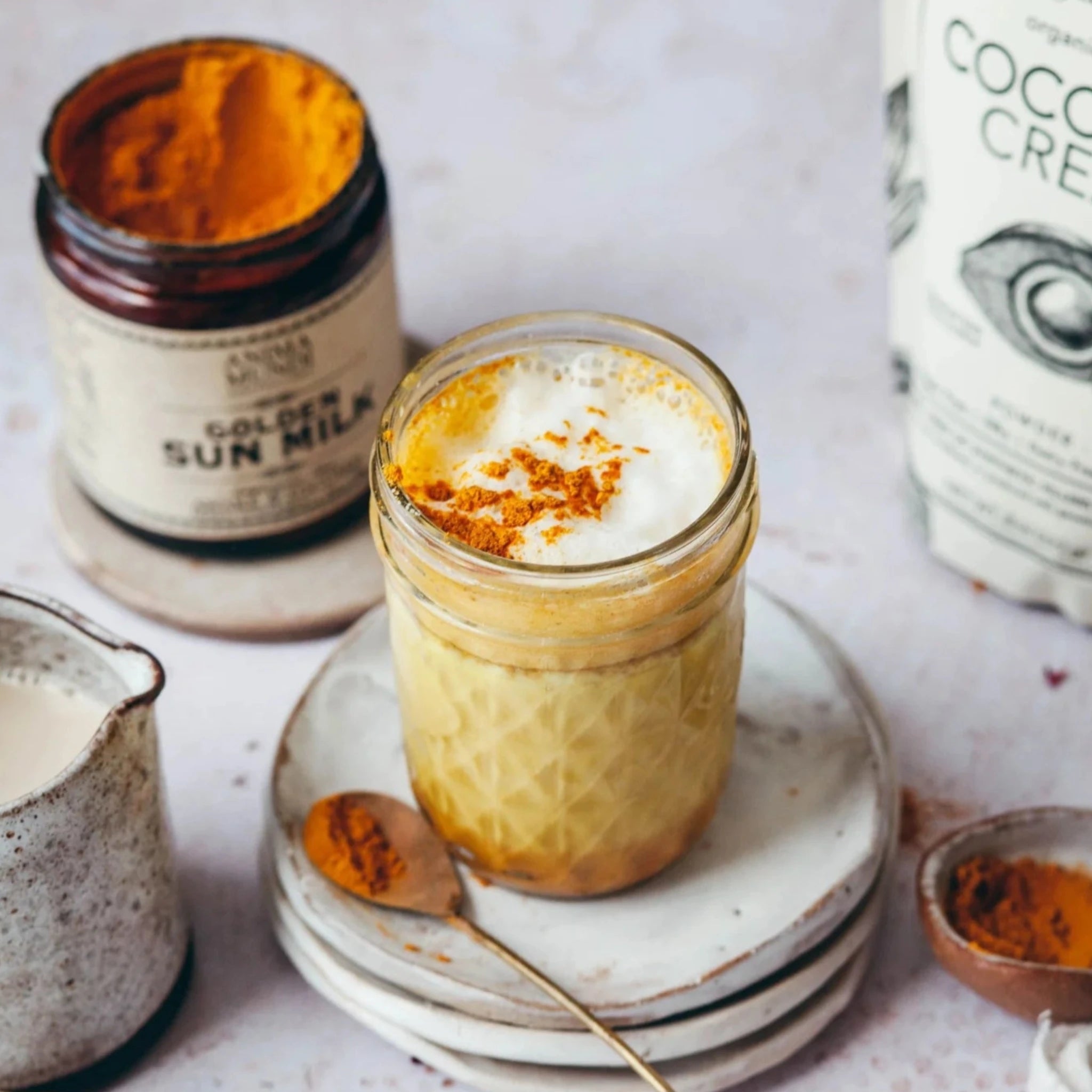 Golden milk, a traditional Ayurvedic drink known as haldi doodh, boasts healing and anti-inflammatory properties from curcumin in Turmeric. Available at Vayu Living.
