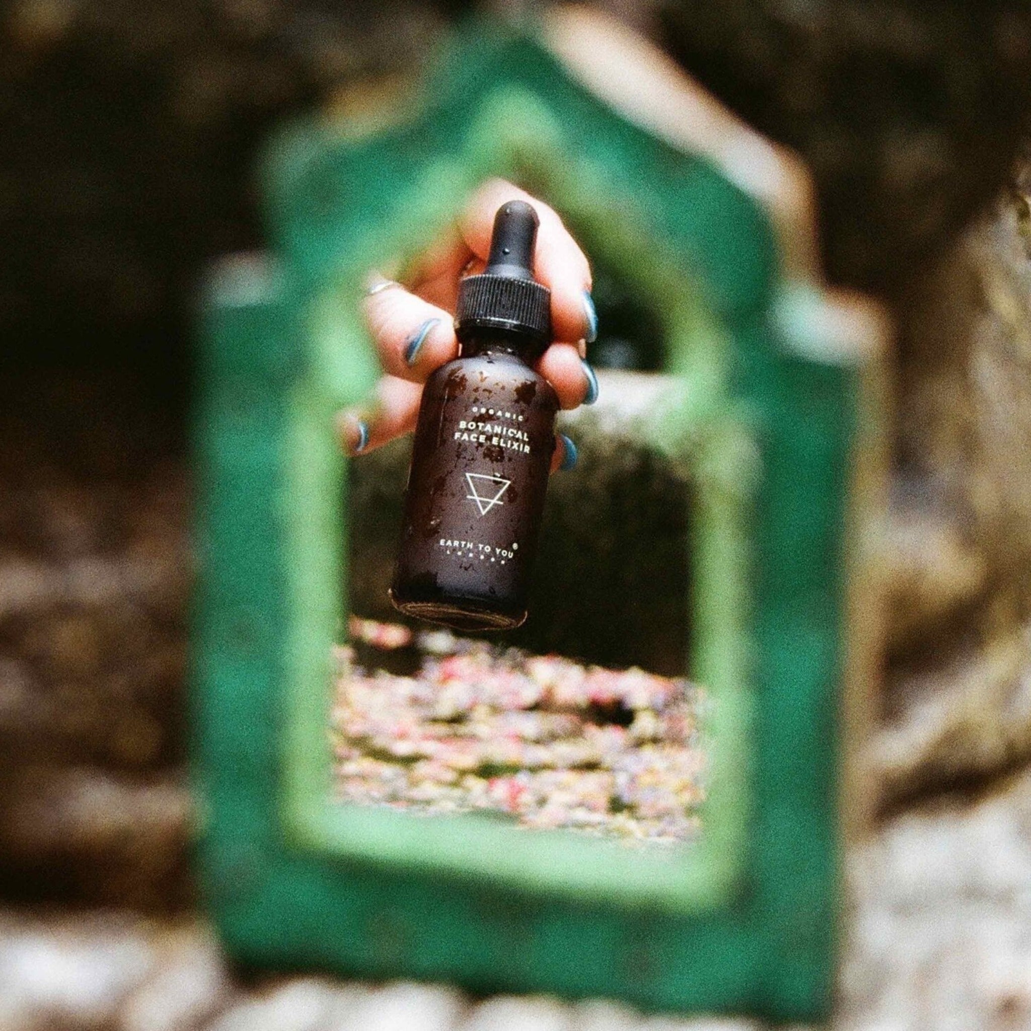 A transformative Botanical Face Elixir, unveiling radiant, luminous skin. Available at Vayu Living.