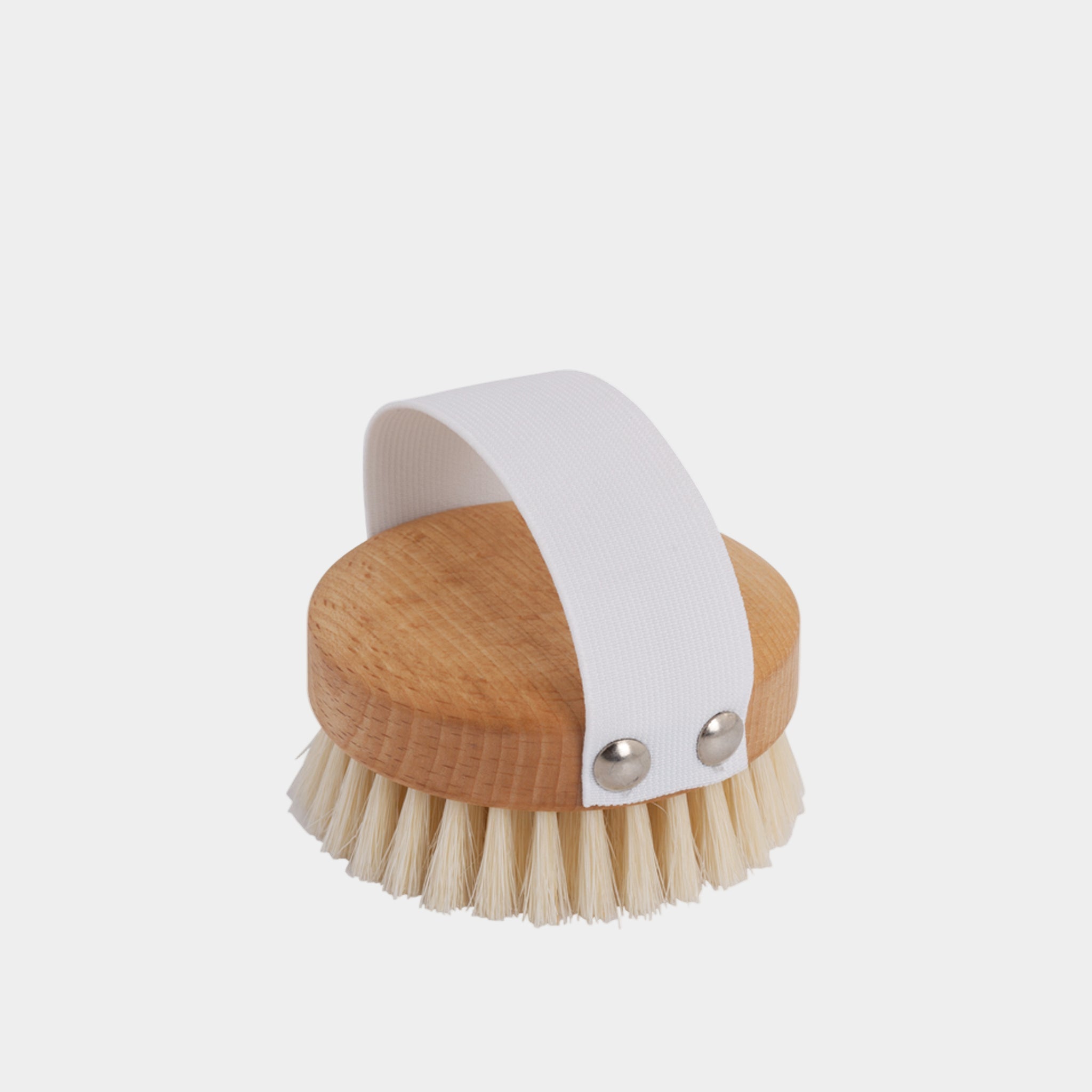 Compact Body Brush is the ideal companion for your daily dry-brushing ritual. Available at Vayu Living.