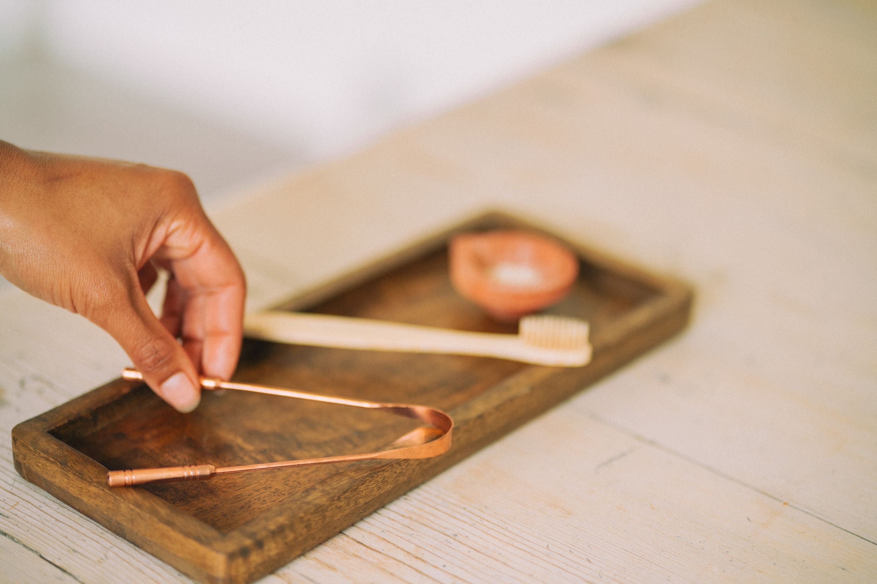 Experience the ancient Ayurvedic practice of tongue scraping with our Copper Tongue Cleaner. Effective at removing food debris and bacteria, this traditional tool offers a natural solution for fresher breath and improved oral hygiene. Available at Vayu Living.
