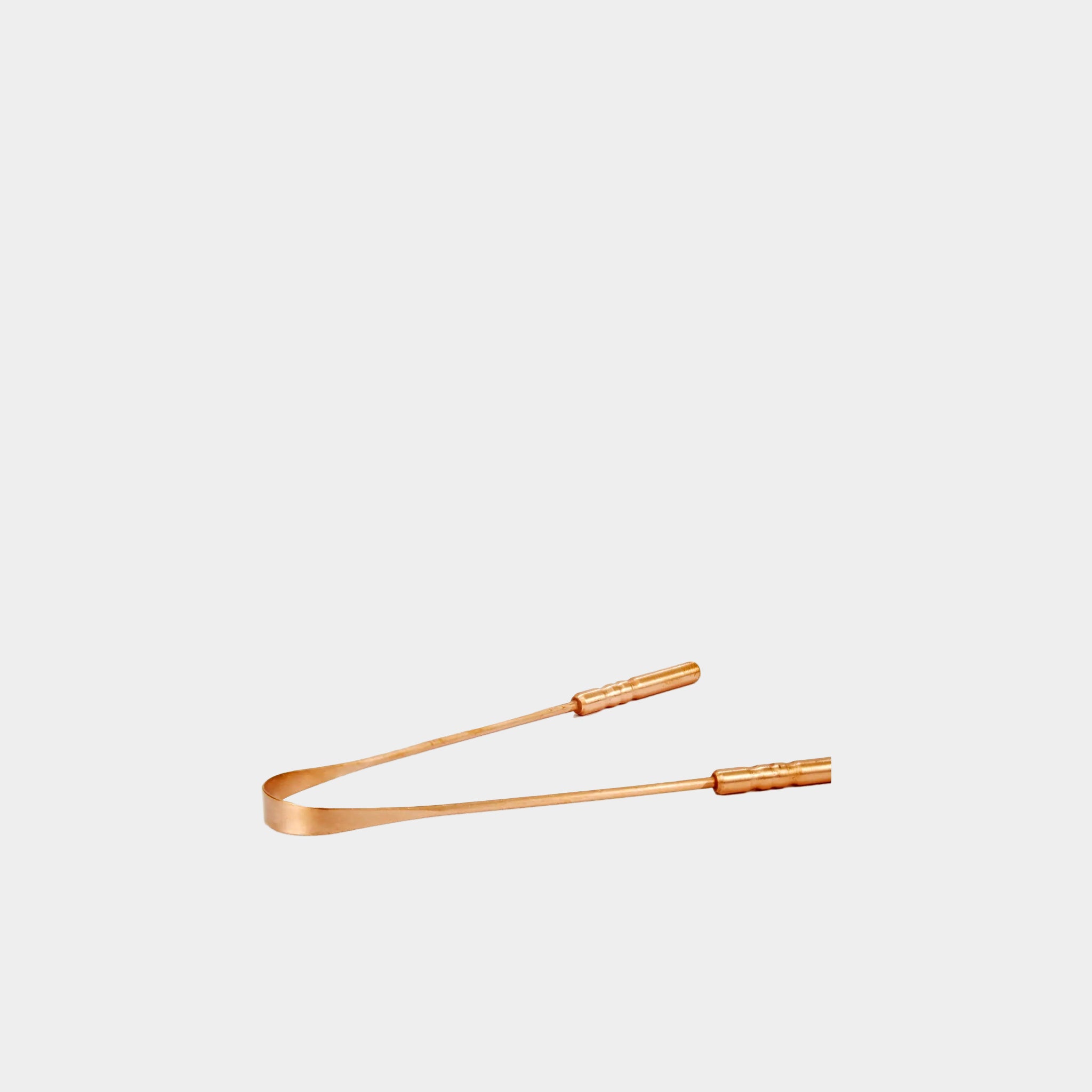 Experience the ancient Ayurvedic practice of tongue scraping with our Copper Tongue Cleaner. Effective at removing food debris and bacteria, this traditional tool offers a natural solution for fresher breath and improved oral hygiene. Available at Vayu Living.