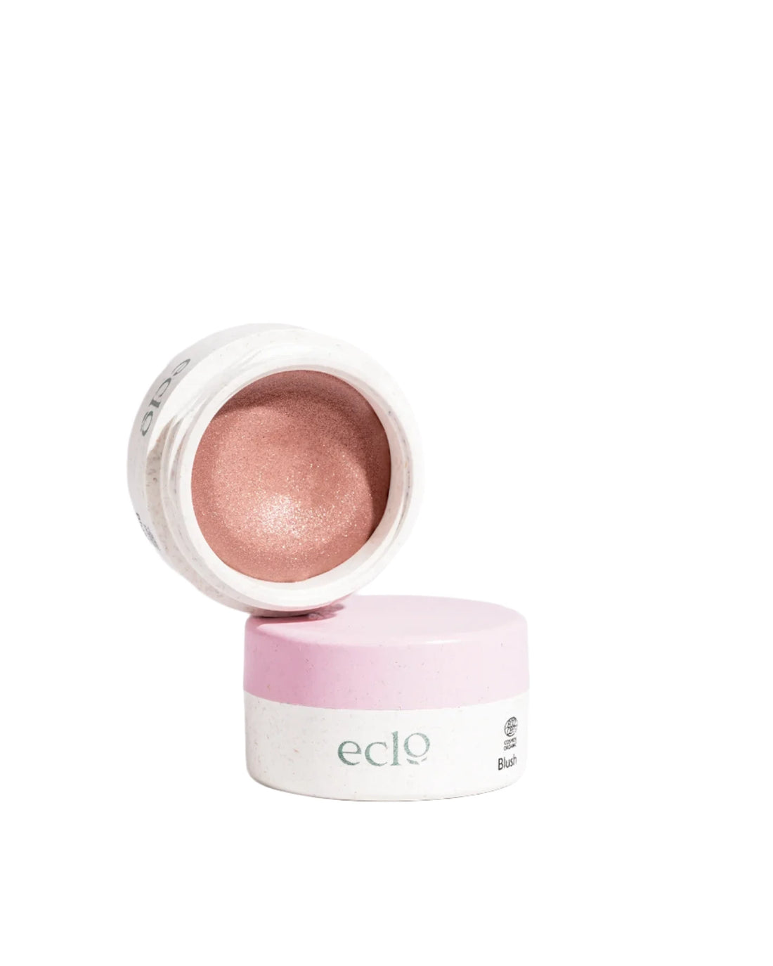 Eclo Highlighter Blush in Pink Nude offers a semi-solid formula enriched with vegetable wax for a smooth, seamless application. Available at www.vayuliving.com