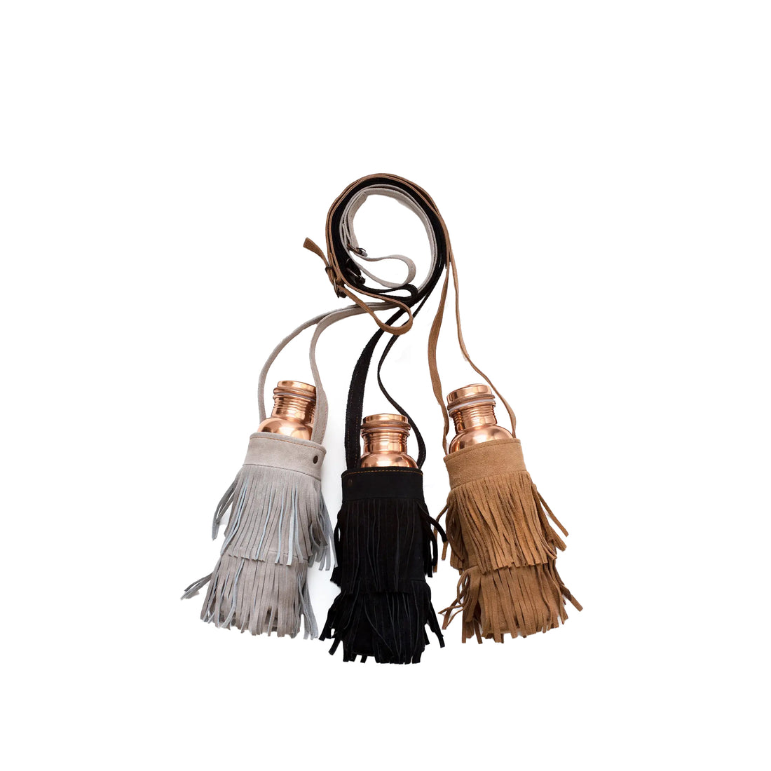 Upgrade your hydration style with this fabulous handcrafted suede fringe bottle carrier! Available at vayuliving.com