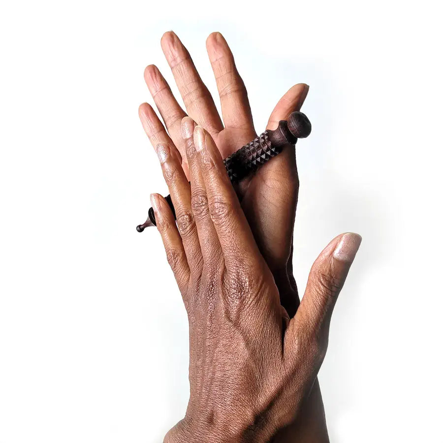 This hand-carved Ayurveda massage stick is a must-have for anyone feeling the strain of long hours on computers or phones. Available at vayuliving.com
